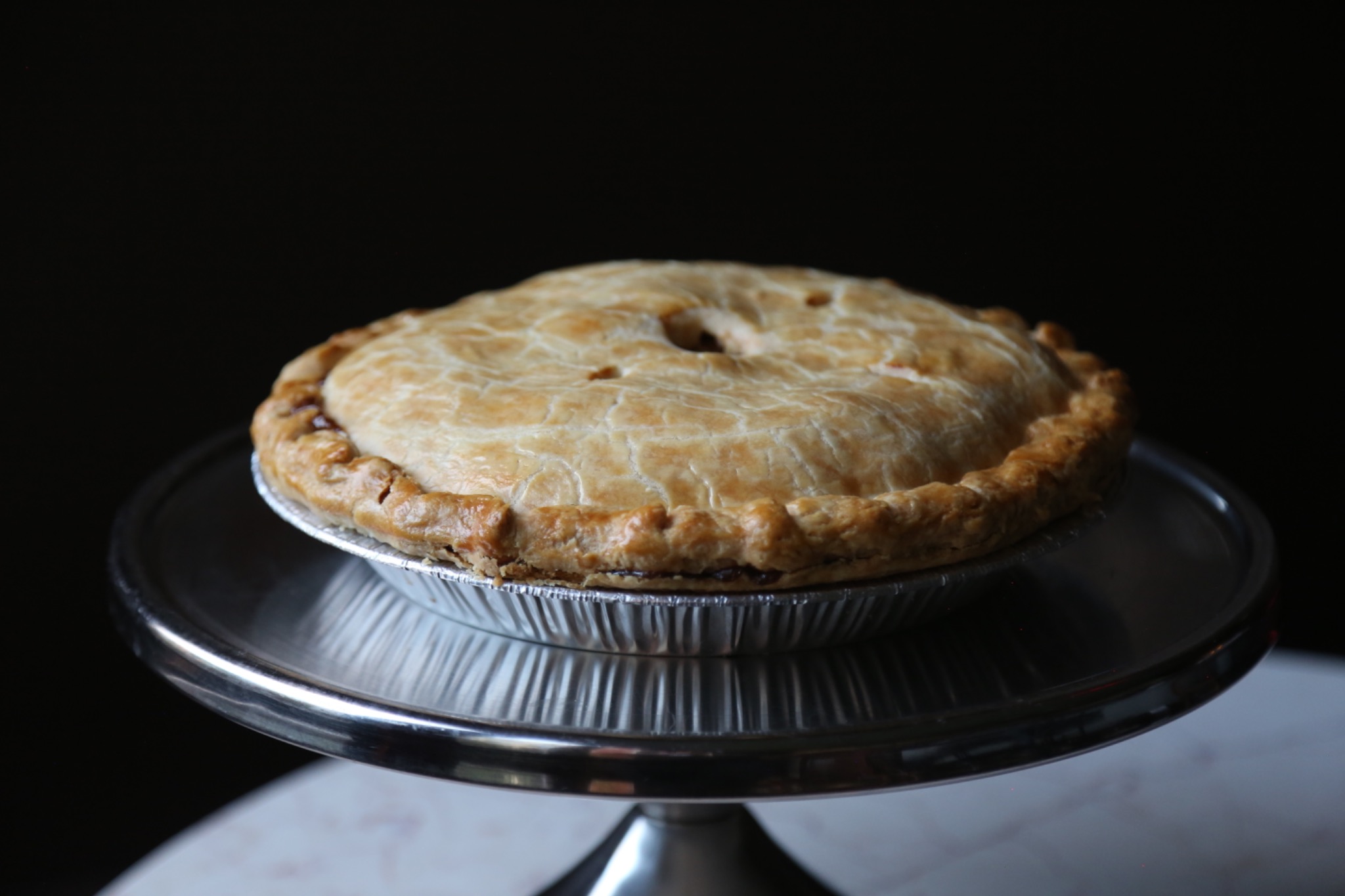 Pie on a metal cake stand