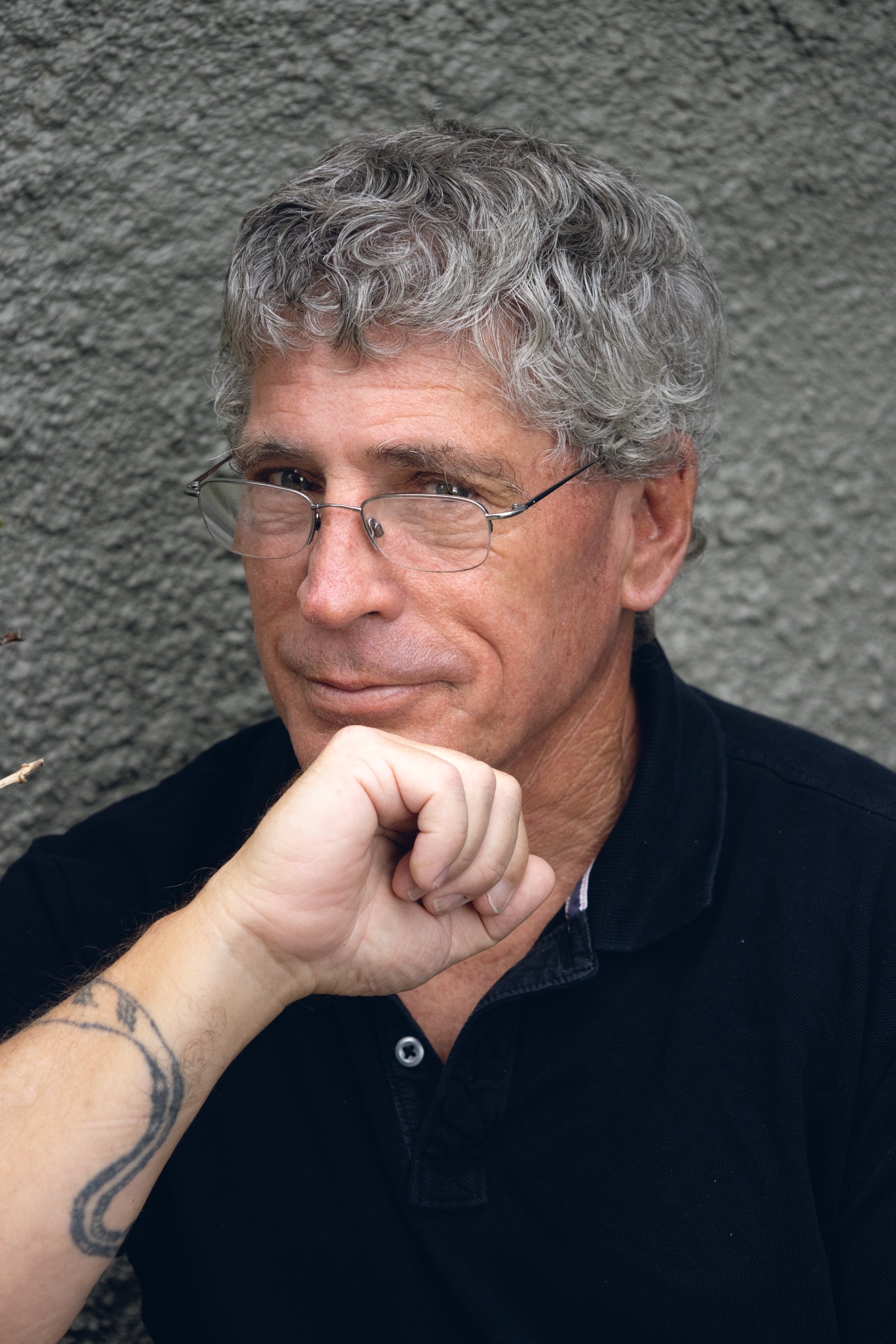 Nassau County Poet Laureate Peter V. Dugan wearing glasses
