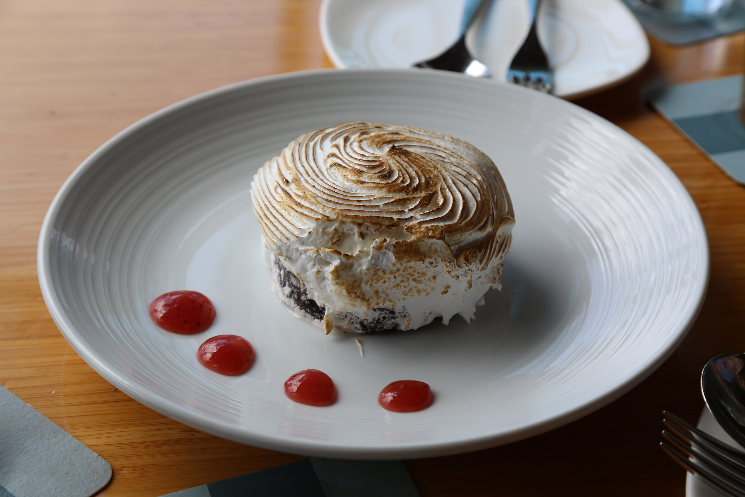 Baked Alaska dessert with toasted meringue and berry sauce at Grand Wailea